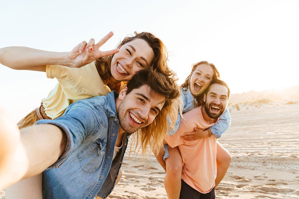 Man with friends after meth treatment